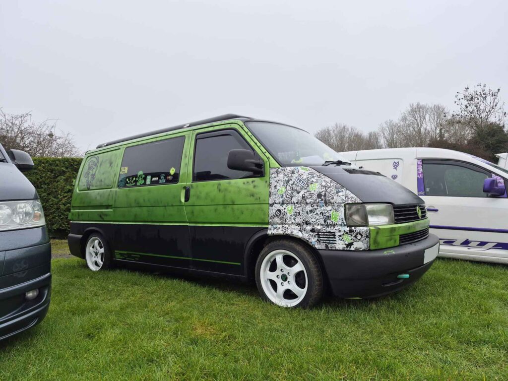 Dan's VW T4 Campervan Story Elain Midlands Dub Club and Real Van Life 1 VW T4 Elain parked on grass at a VW show with lowered stance and custom styling