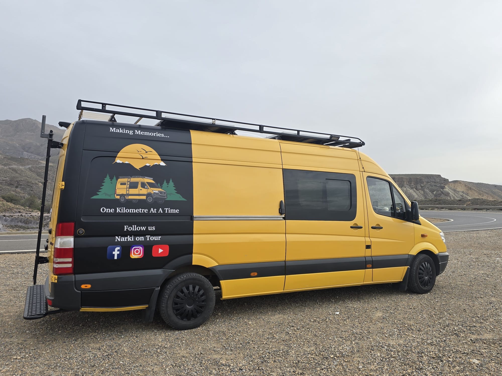 van life Europe Mercedes Sprinter campervan Chloé parked in mountain landscape