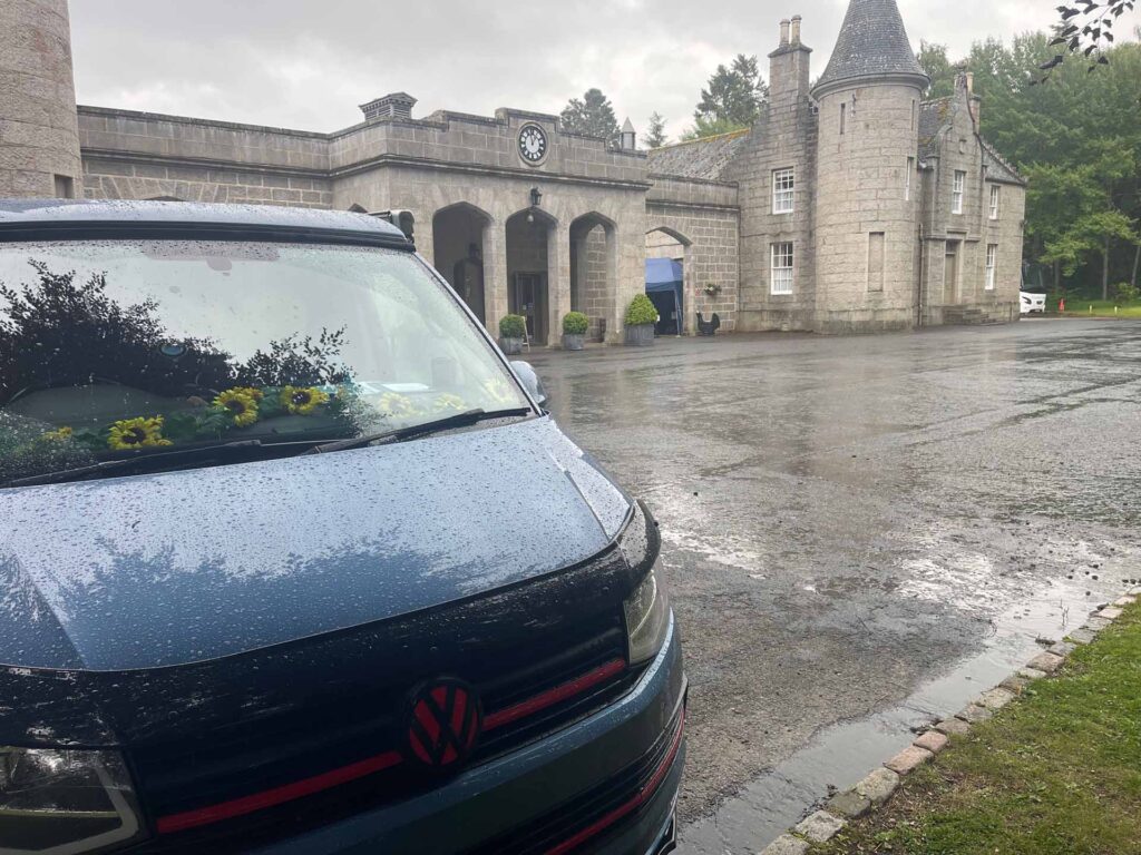VW T6 Camper Van Lifestyle: Life on the Road with Franky the Campervan 2 VW T6 camper van parked outside Balmoral Castle during UK road trip