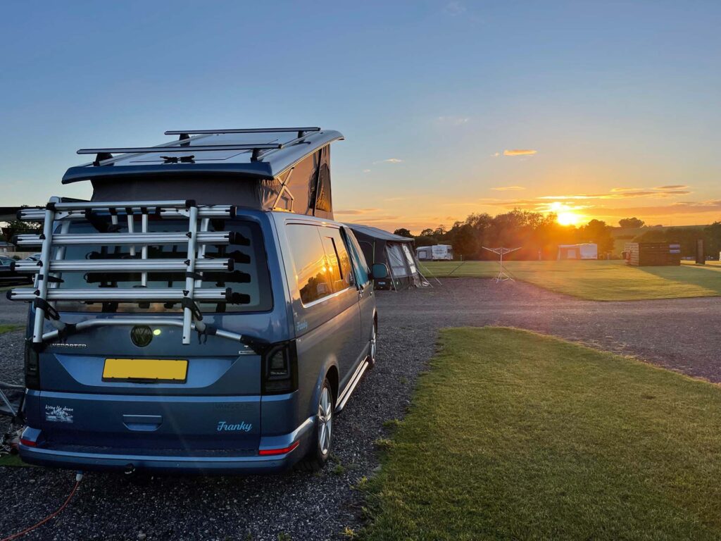 VW T6 Camper Van Lifestyle: Life on the Road with Franky the Campervan 1 VW T6 camper van lifestyle sunset campsite evening with pop-top roof