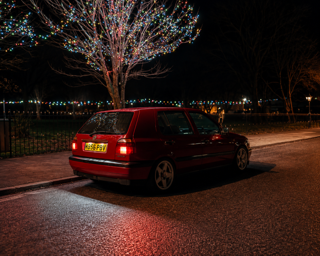 Gertrude, Ben’s red Volkswagen Golf Mk3, photographed at night