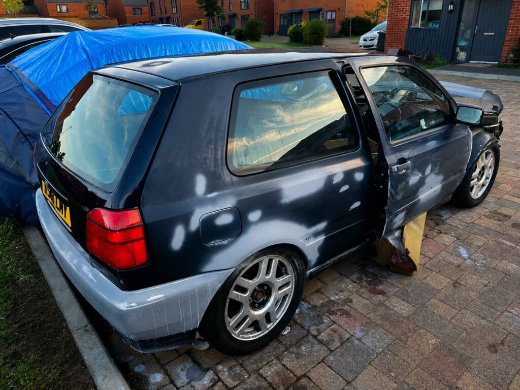 Built, Not Bought: The Story Behind Luke's Modified Mk3 Golf 1 Luke's modified Mk3 Golf undergoing bodywork on his driveway