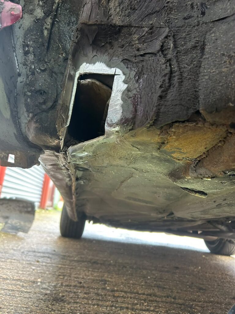 Just Another Ten Miles 3 Rotten metal cut from the sill during Dave Keenan's Mk3 Golf GTI repair