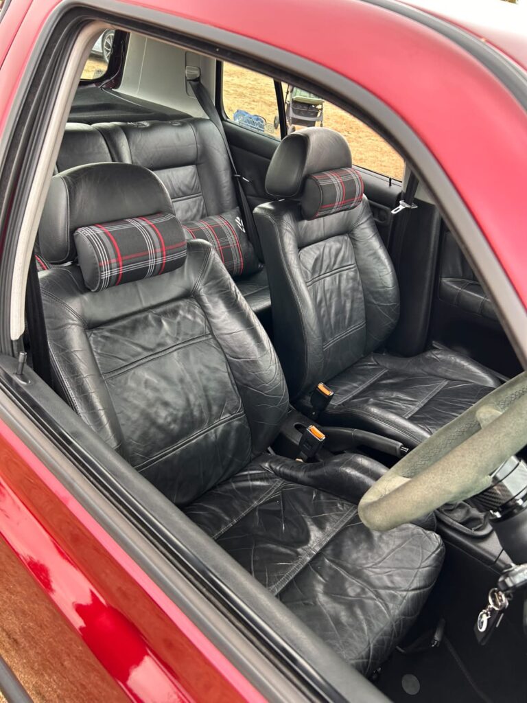 Just Another Ten Miles 11 Retro GTI tartan headrest details inside Dave Keenan's modified Mk3 Golf GTI