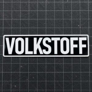 Volkstoff brand name sticker white lettering on black