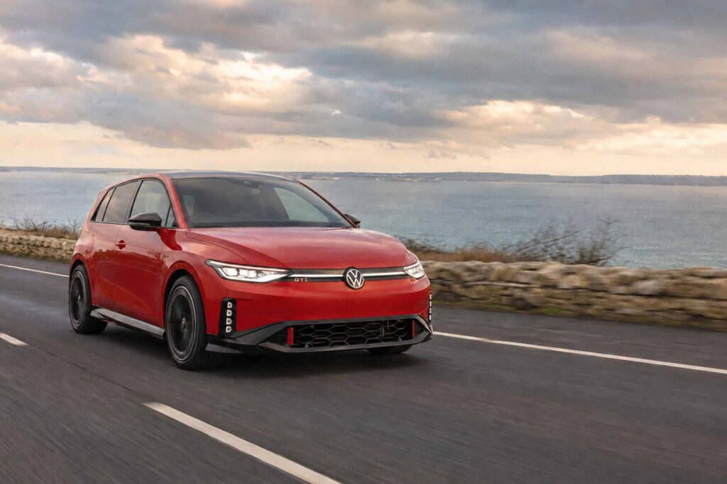 50 Years of the Golf GTI: The Car That Changed VW Culture 4 Editorial illustration of an electric Volkswagen ID Polo GTI on a coastal road