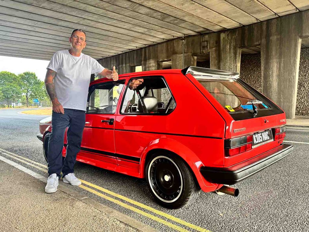 Richy Horton’s Turbo Volkswagen Golf Mk1: Competition History Meets 20V Power 1 Richy Horton with his red Volkswagen Golf Mk1 in Portsmouth