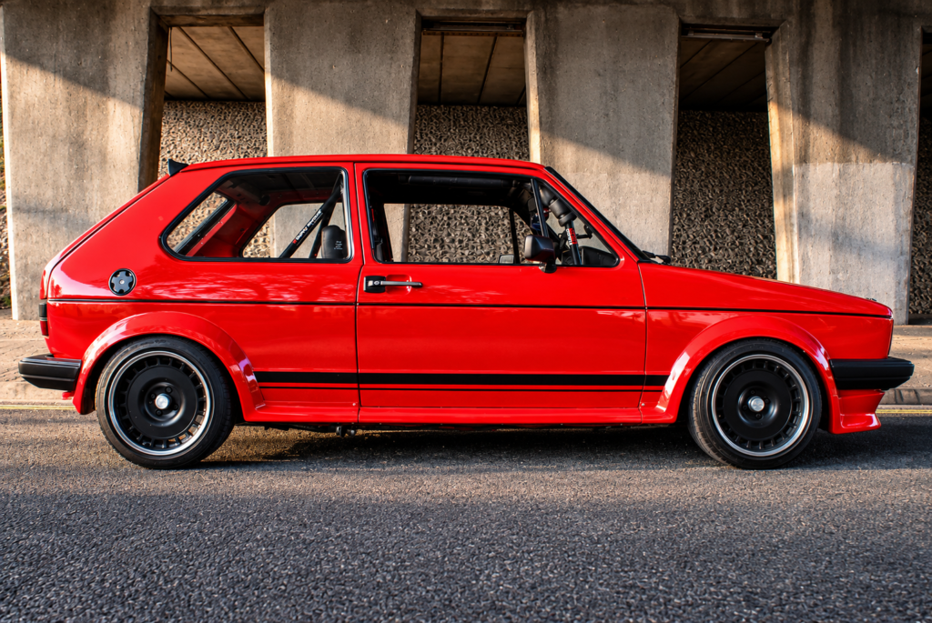 Richy Horton’s Turbo Volkswagen Golf Mk1: Competition History Meets 20V Power 2 Richy Horton’s red Volkswagen Golf Mk1 photographed beneath a Portsmouth underpass